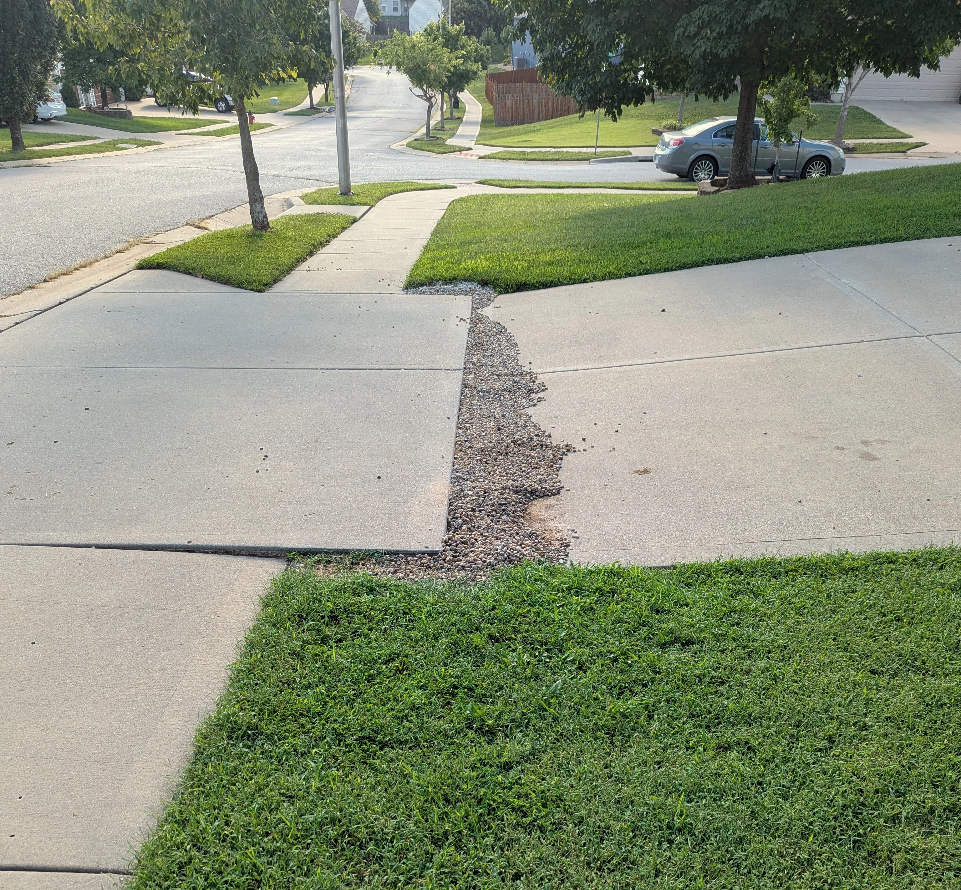 Gravel bypass over the settled driveway